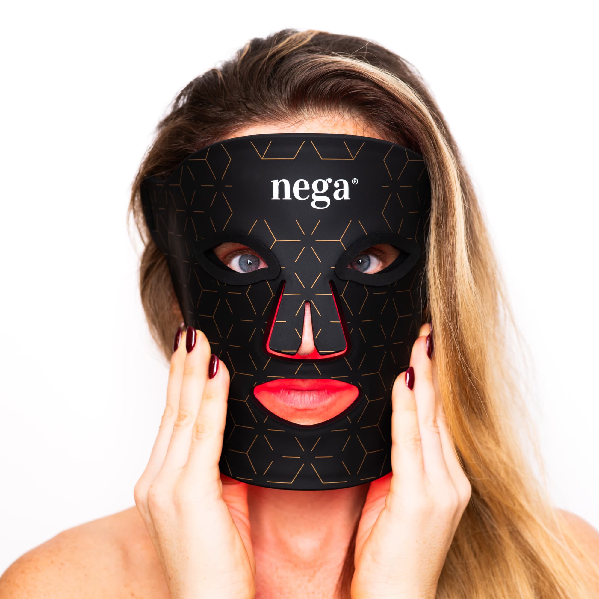 Woman relaxing with LuxGlow LED mask
